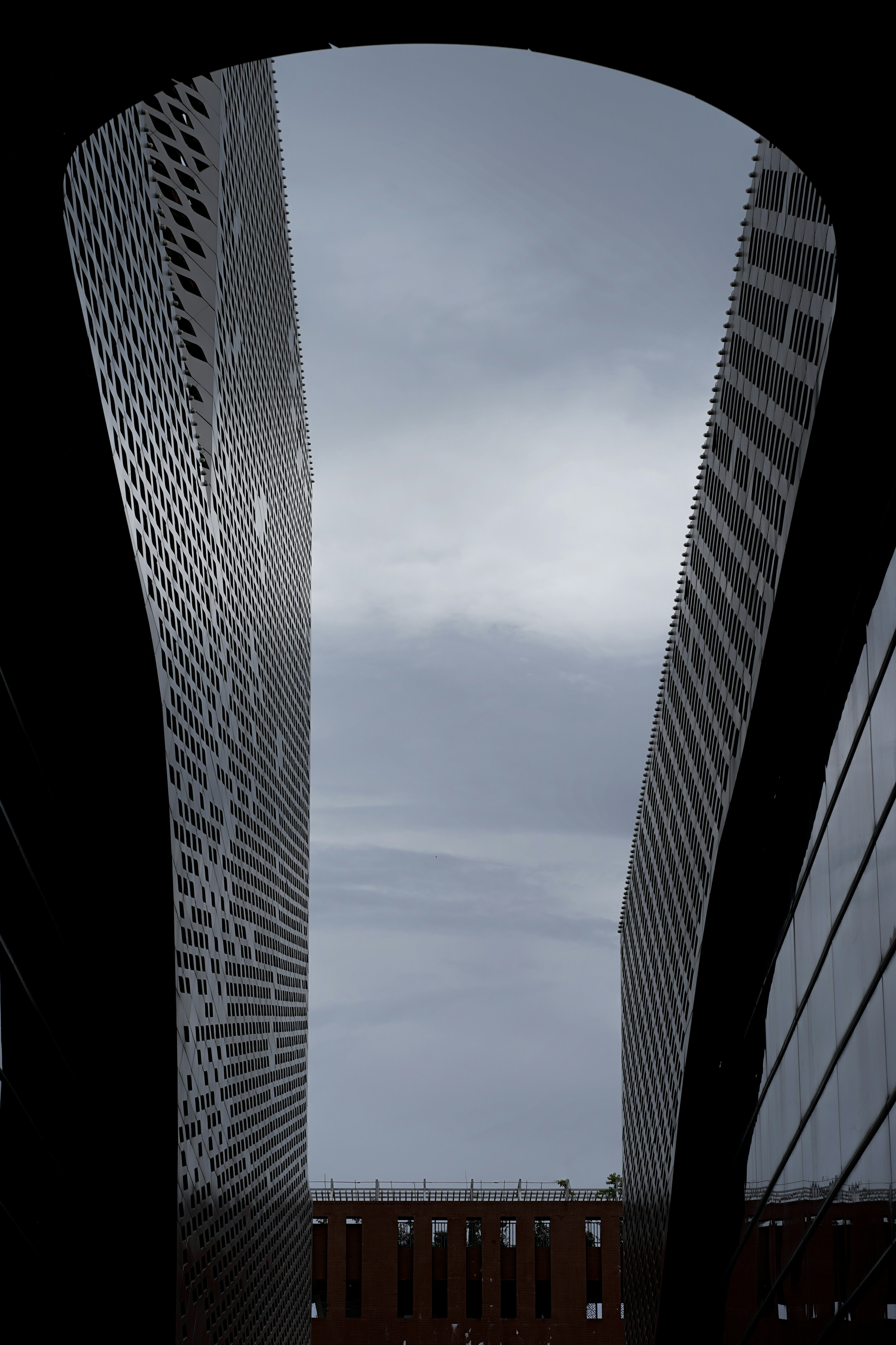 a couple of tall buildings next to each other