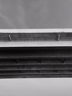 Monochrome image of a modern bridge structure highlighting engineering integrity.