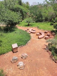 A peaceful community garden with seating areas.