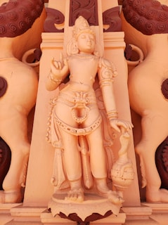 A serene 3D printed figure of Lord Shiva with intricate beads and trident.