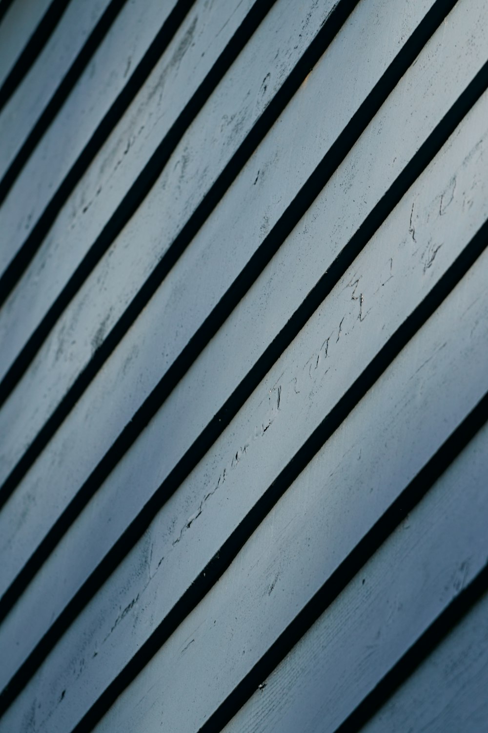 a close up of a building with a clock on the side of it