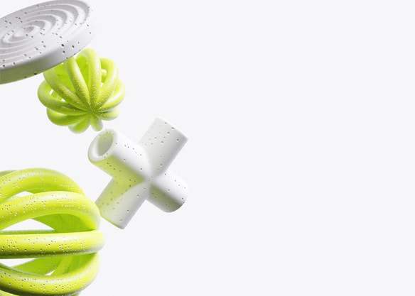 A collection of abstract 3D geometric shapes, including a white spiral disc, a green twisted torus, a spherical green object with a petal-like structure, and a white cross-like form. These shapes have a smooth, glossy texture with small black speckles and are set against a plain light background.