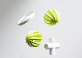 a cross, a ball of yarn, and a ball of yarn