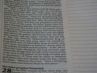 A page from a book with printed text in two columns. The text appears to be a religious or historical passage. The left page contains detailed printed text, while the right page is mostly blank with dotted lines.