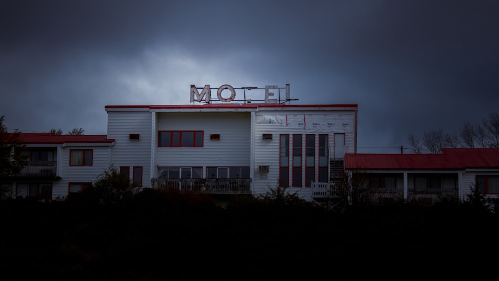 a building with a motel sign on top of it