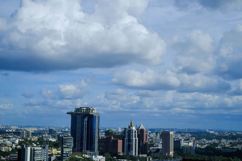 Bangalore skyline with Vidhana Soudha area buildings, representing rising property prices