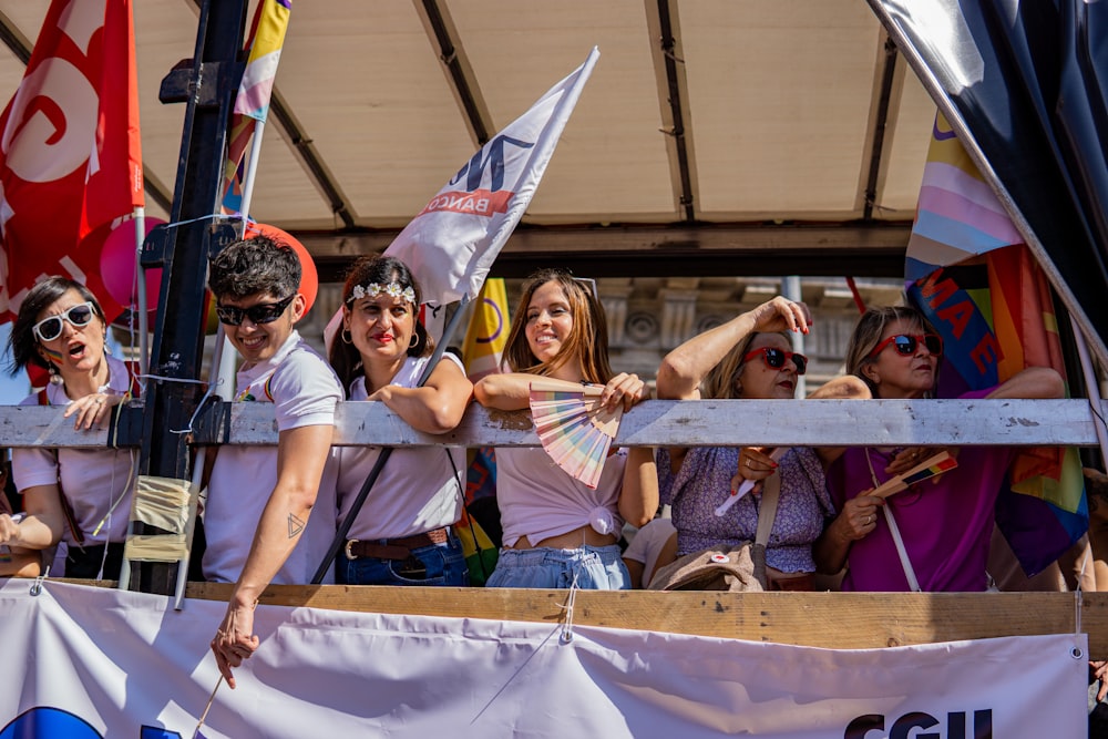 a group of people standing next to each other