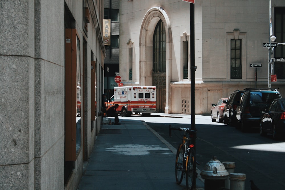 an ambulance is parked on the side of the street