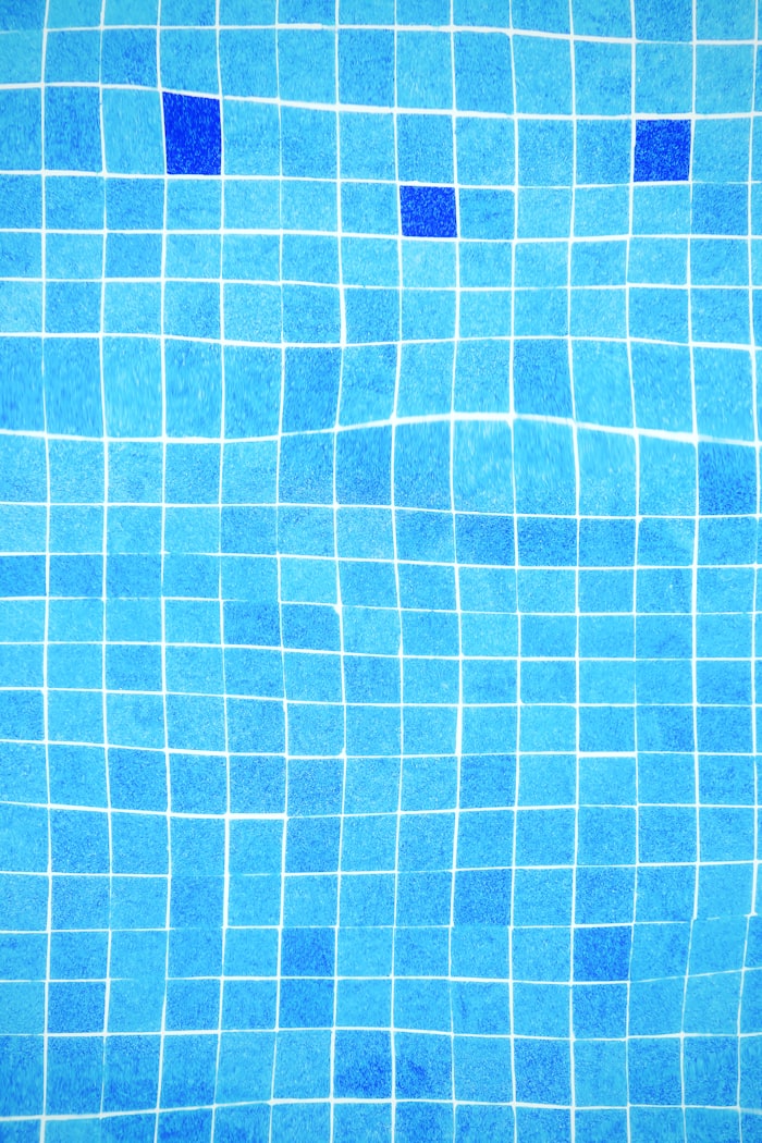 Bright, clean pool tile after calcium removal and an acid wash