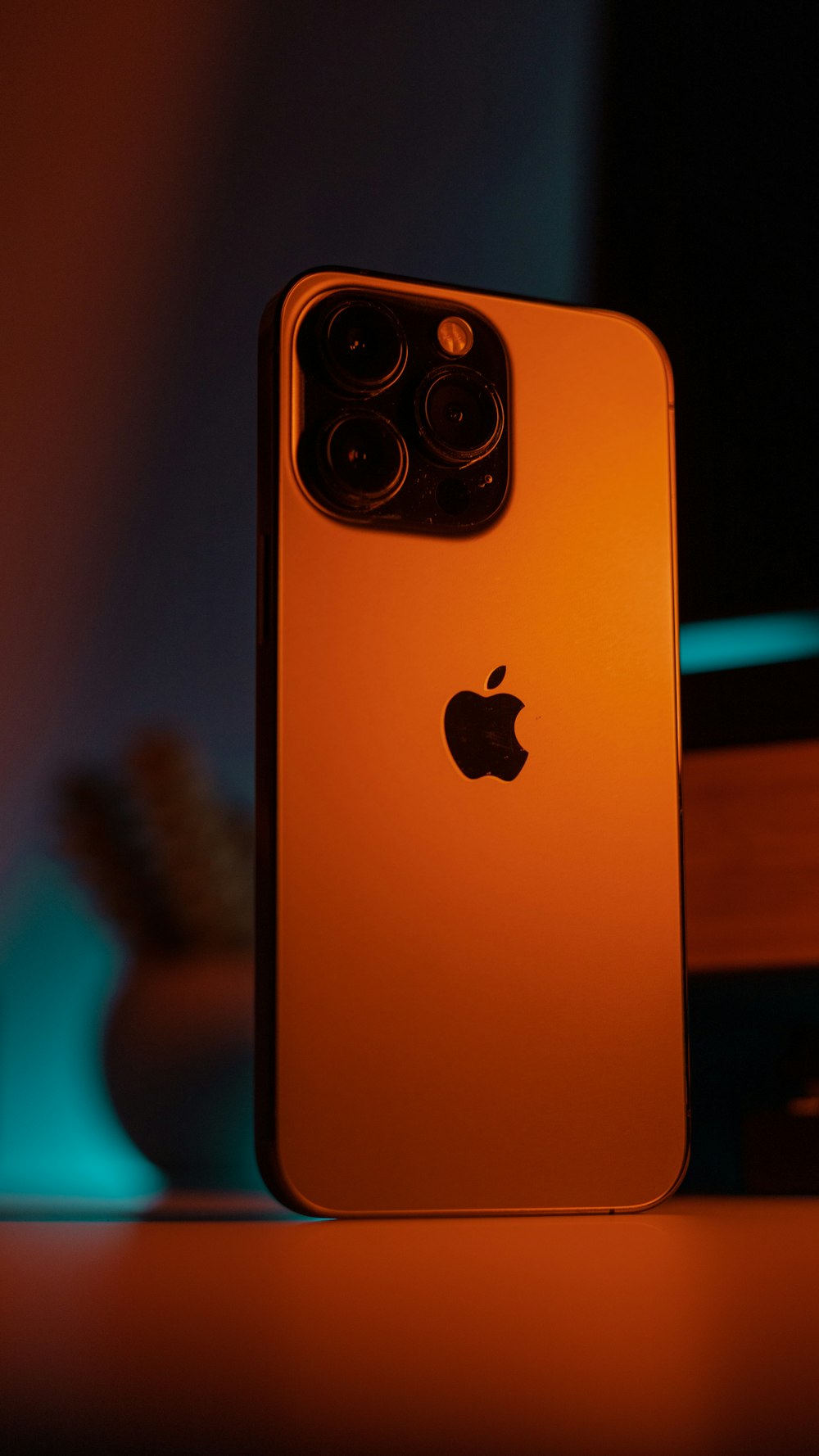 a close up of an apple phone on a table