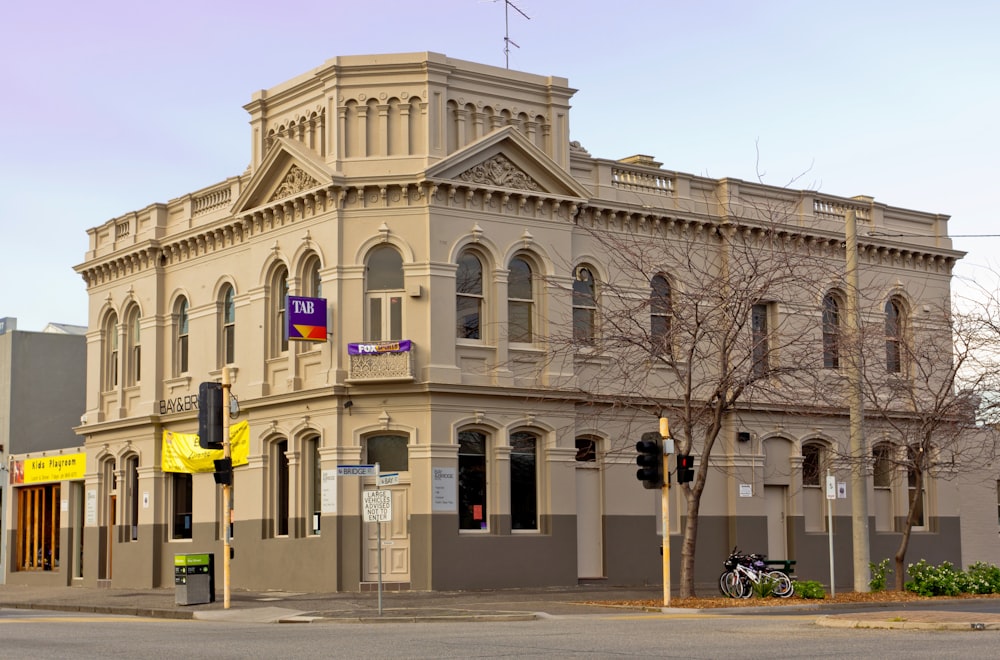 an old building on the corner of a street