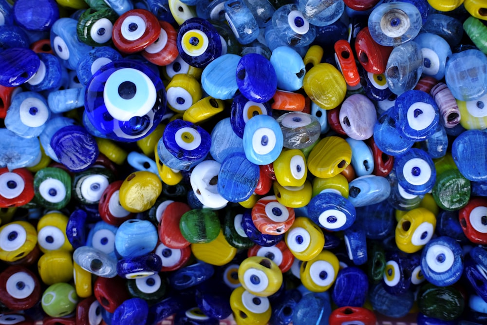 a large pile of colorful plastic eye beads