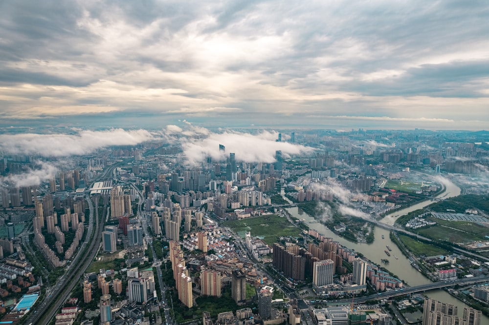 an aerial view of a city with a river running through it