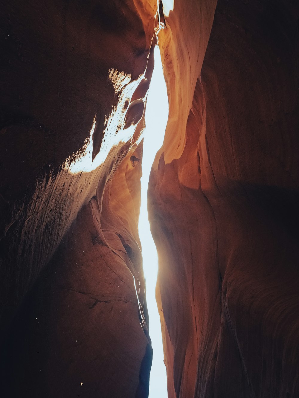 a narrow slot in the side of a mountain