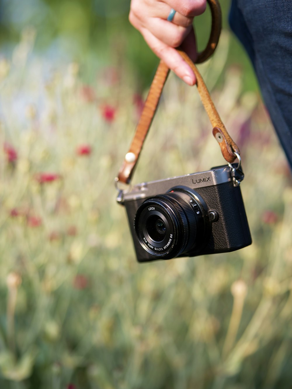 a person holding a camera in their hand