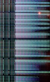 Close-up of a high-resolution screen displaying colorful marketing graphics.