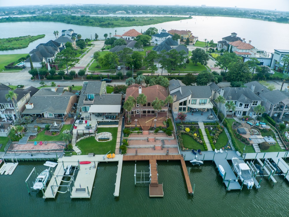 an aerial view of a home on the water