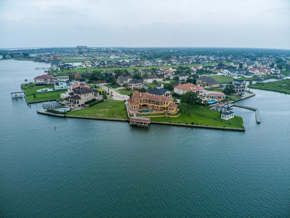 an aerial view of a house on a small island