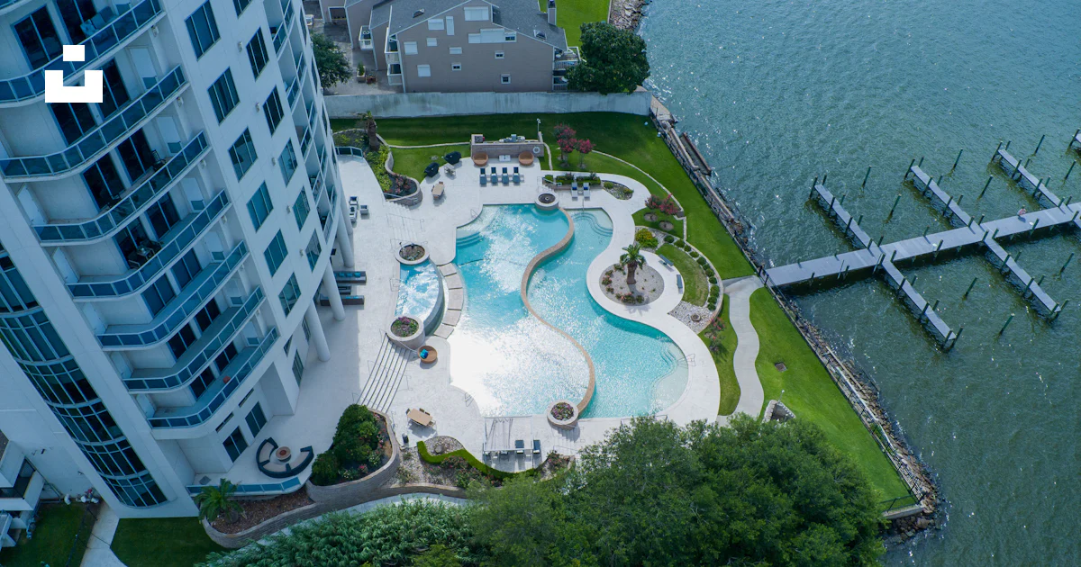An aerial view of a large swimming pool photo – Free Videos Image on ...
