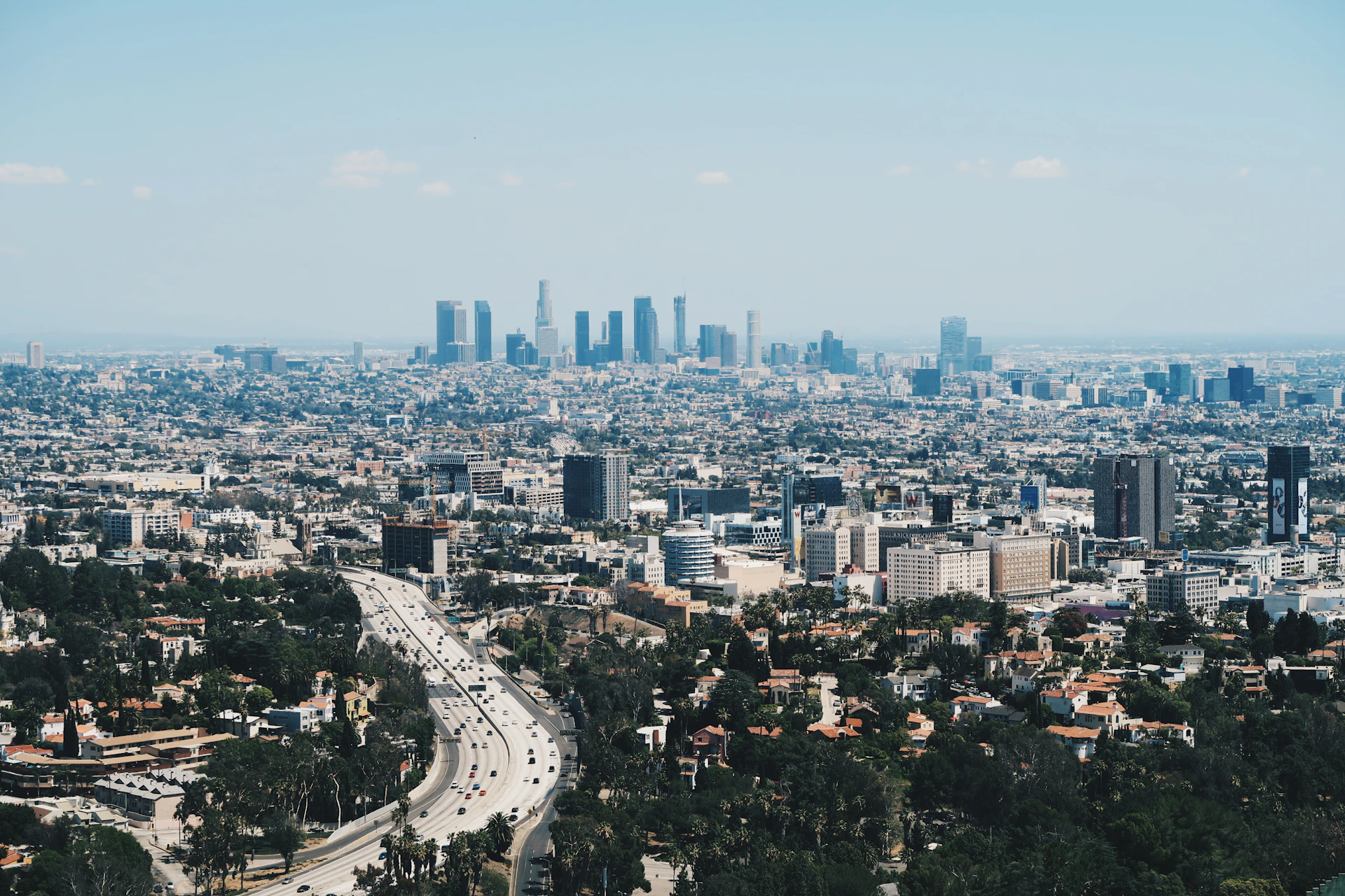 black and brown leather padded tub sofa