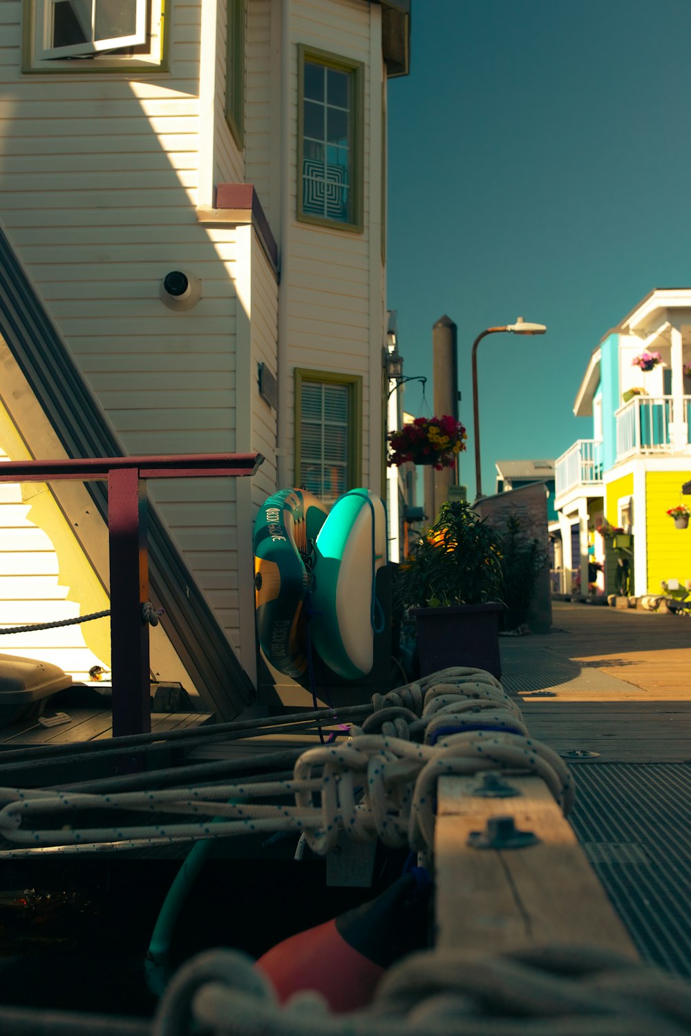 a boat is docked in front of a house