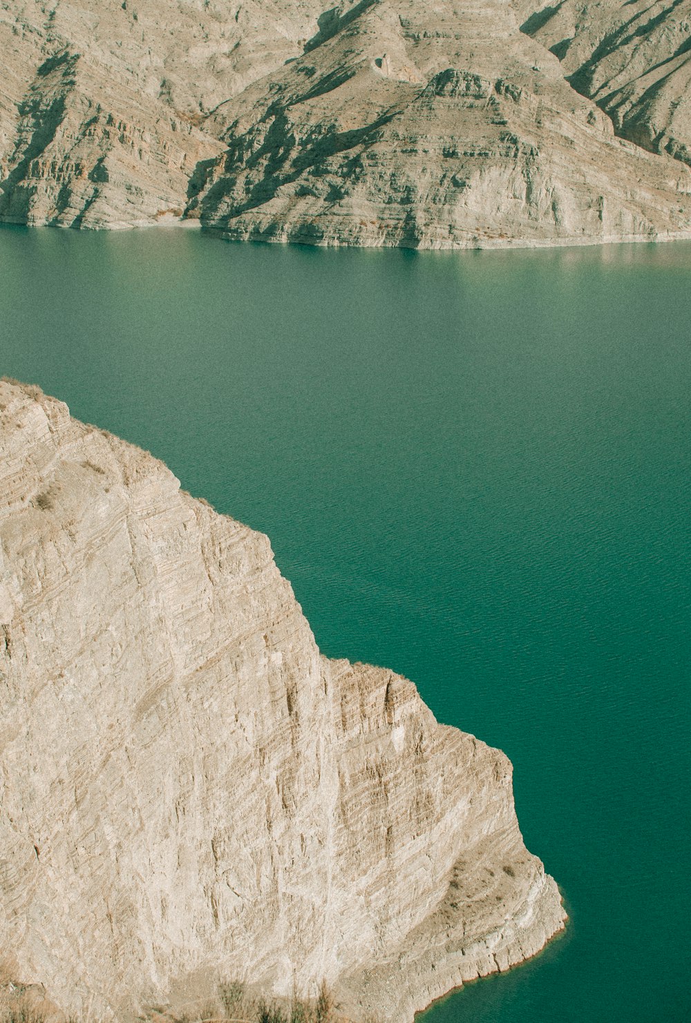 a large body of water surrounded by mountains