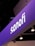 A prominently displayed sign with the name 'sanofi' is illuminated against a purple background. The sign seems to be part of an exhibition or conference setup, with multiple spotlights hanging from the ceiling.
