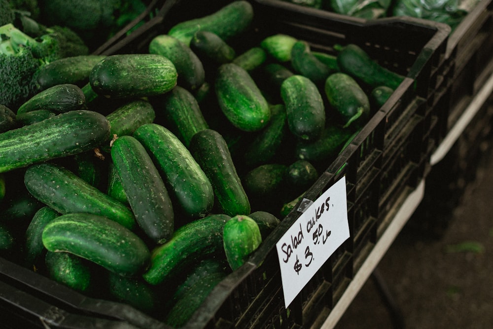 a pile of cucumbers sitting next to each other