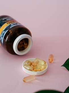 a bottle of pills sitting on top of a table