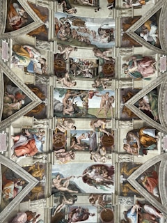 Historic fresco inspired by Sicilian cart art, featuring vibrant colors and intricate patterns.