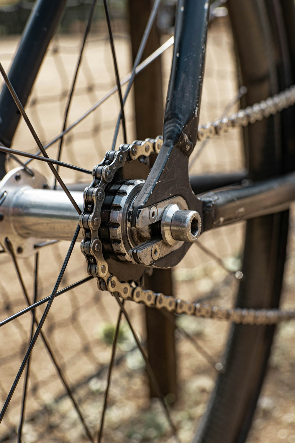 a close up of a bike's chain and gear