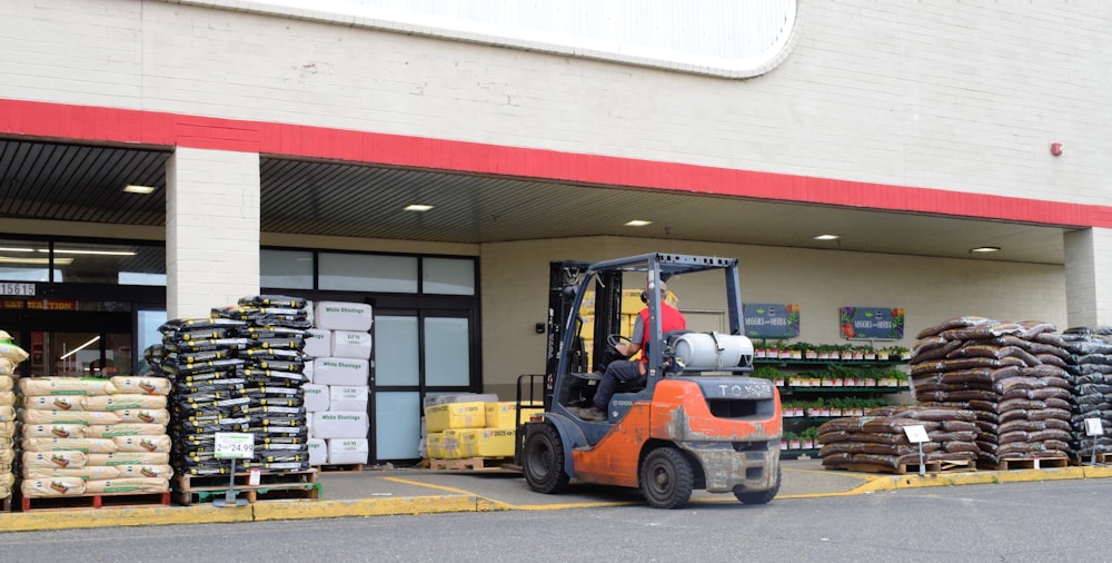 a forklift parked in front of a store