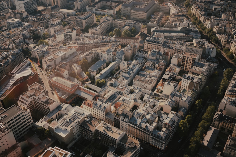 an aerial view of a city with lots of tall buildings