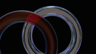 Stylish graphic of intertwined rings in soft, inviting hues symbolizing connection and trust among members.