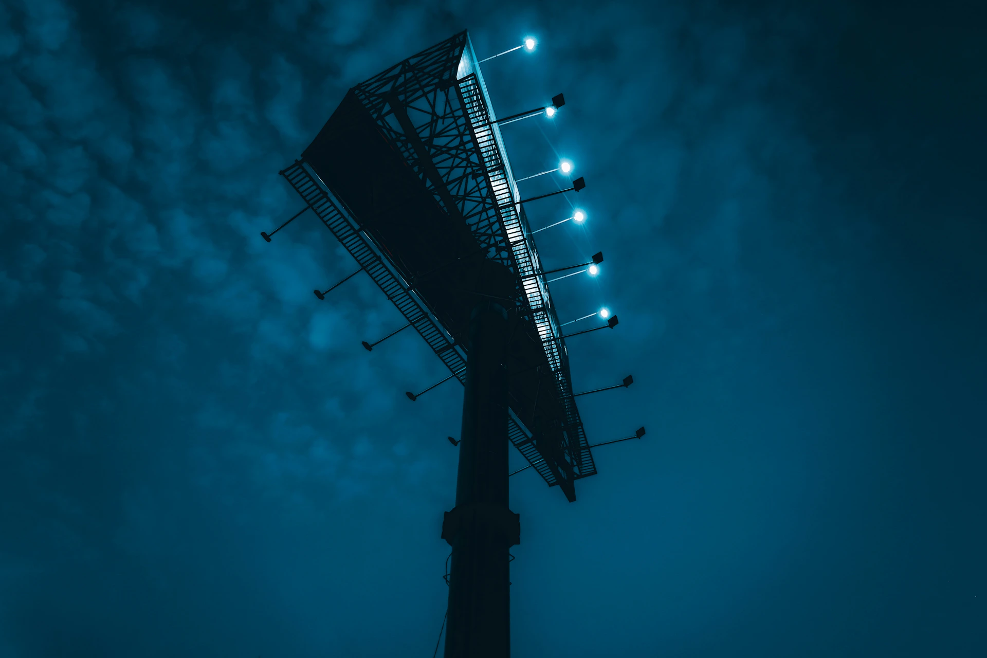 a very tall tower with some lights on top of it