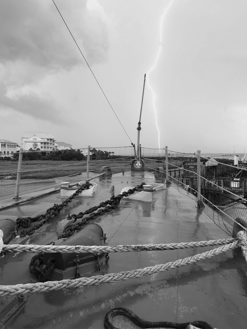 a black and white photo of a boat in the water