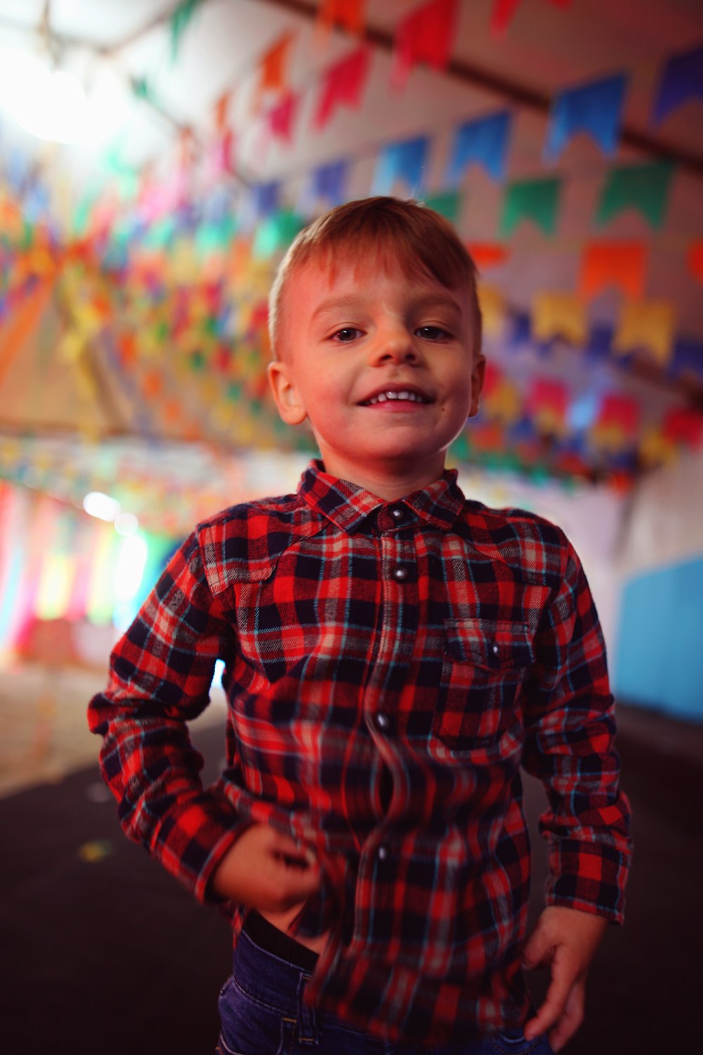 a little boy that is standing in a room