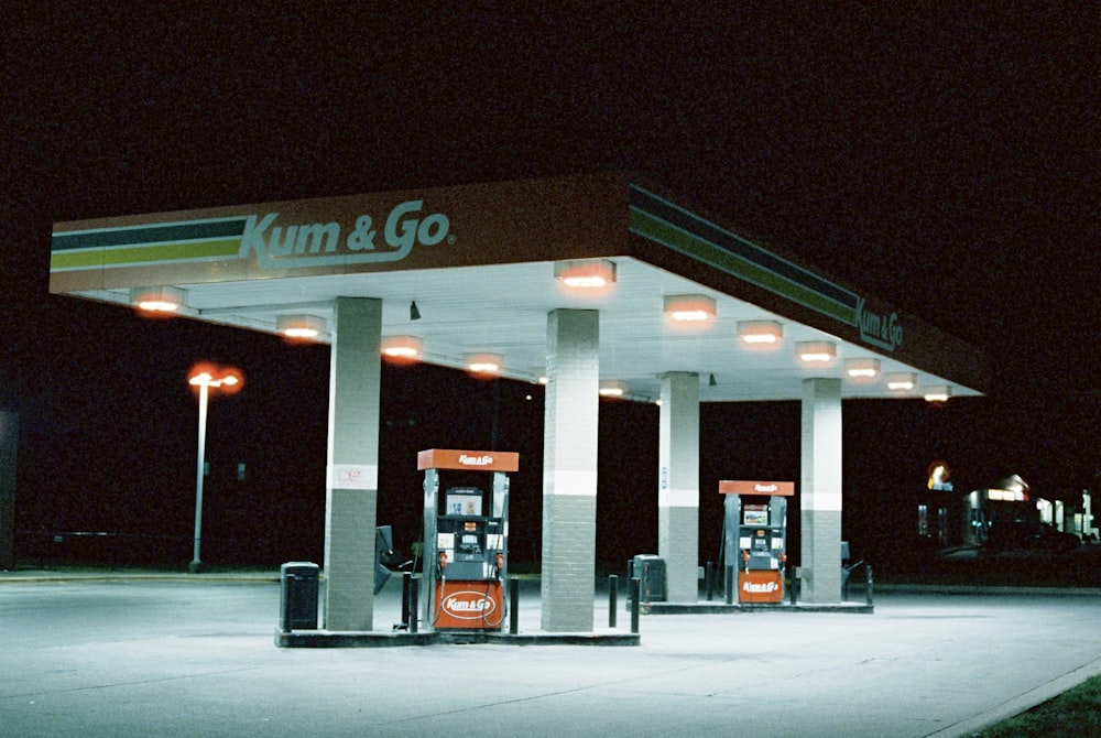 an empty gas station at night with no people