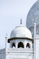 A close-up of intricate Mughal architecture details.