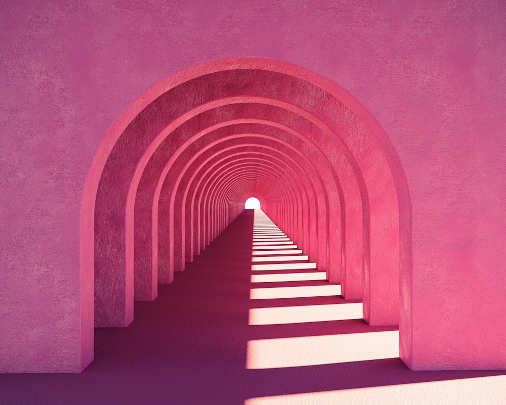 a row of white steps leading into a pink tunnel