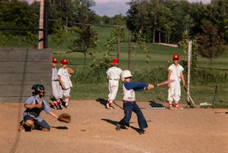 a group of young men playing a game of baseball