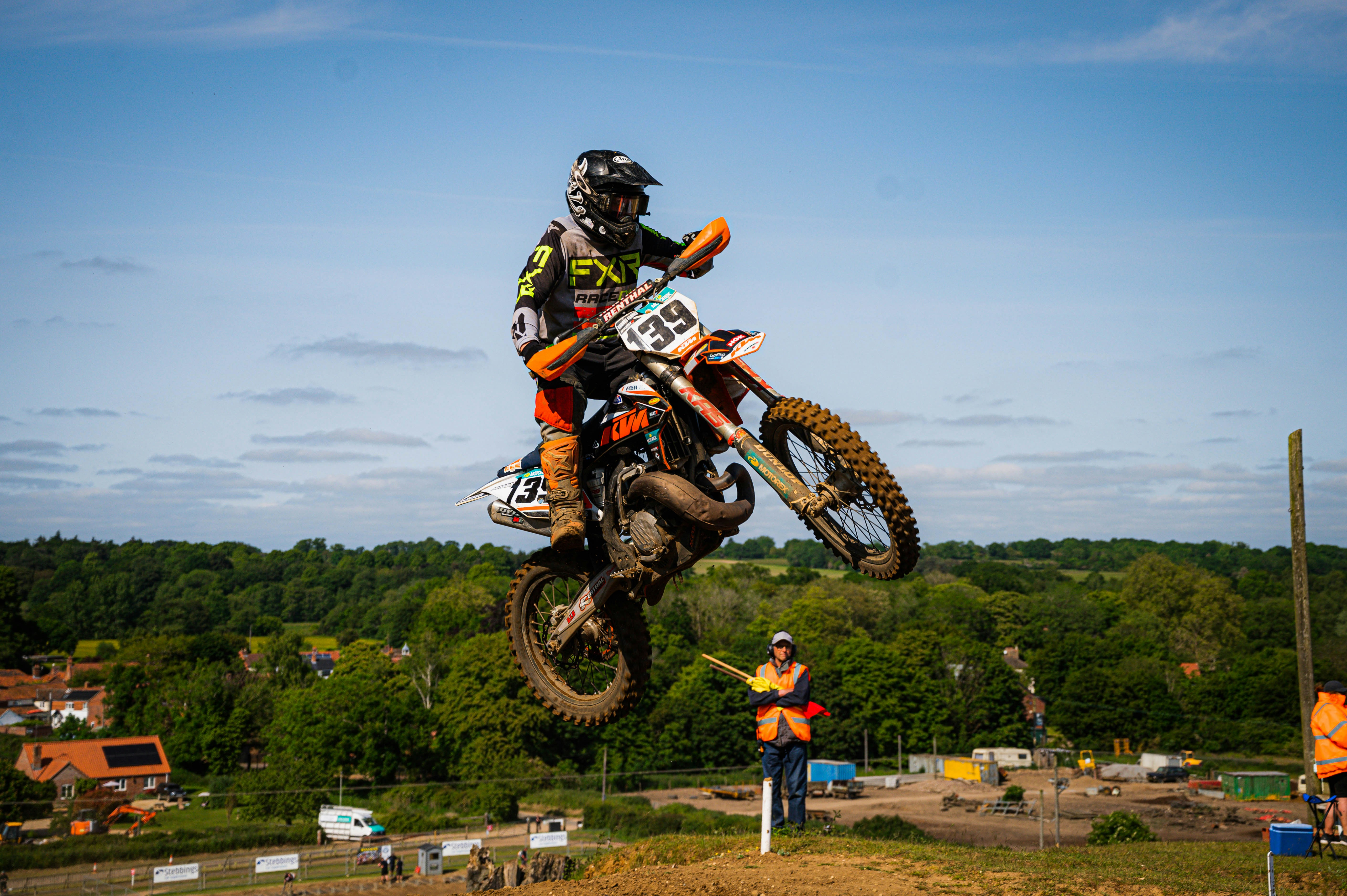 a person on a dirt bike jumping in the air
