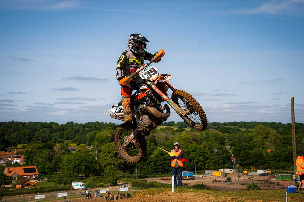 a person on a dirt bike jumping in the air