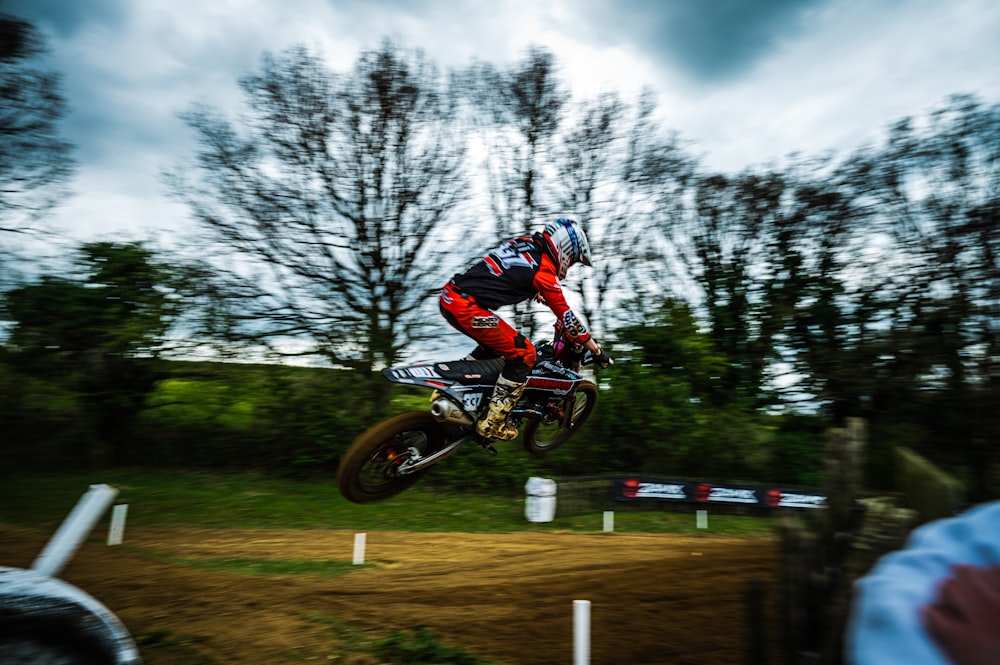 a person on a dirt bike in the air