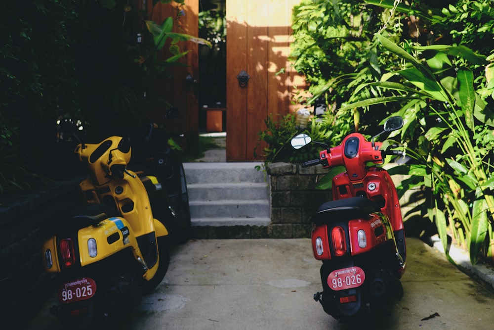 a couple of motor scooters parked next to each other