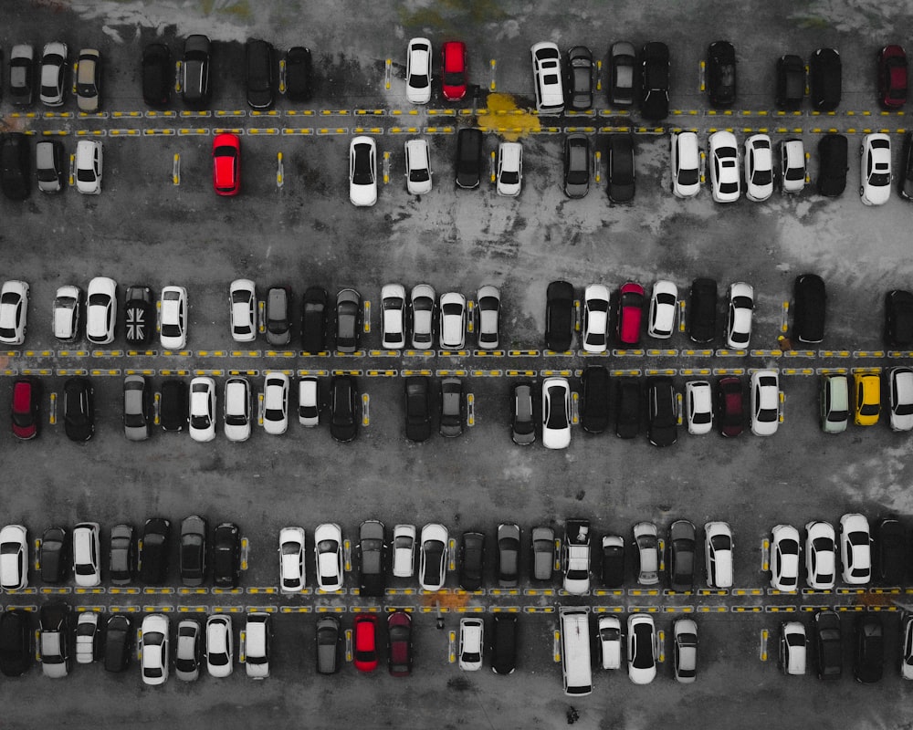 a parking lot filled with lots of parked cars