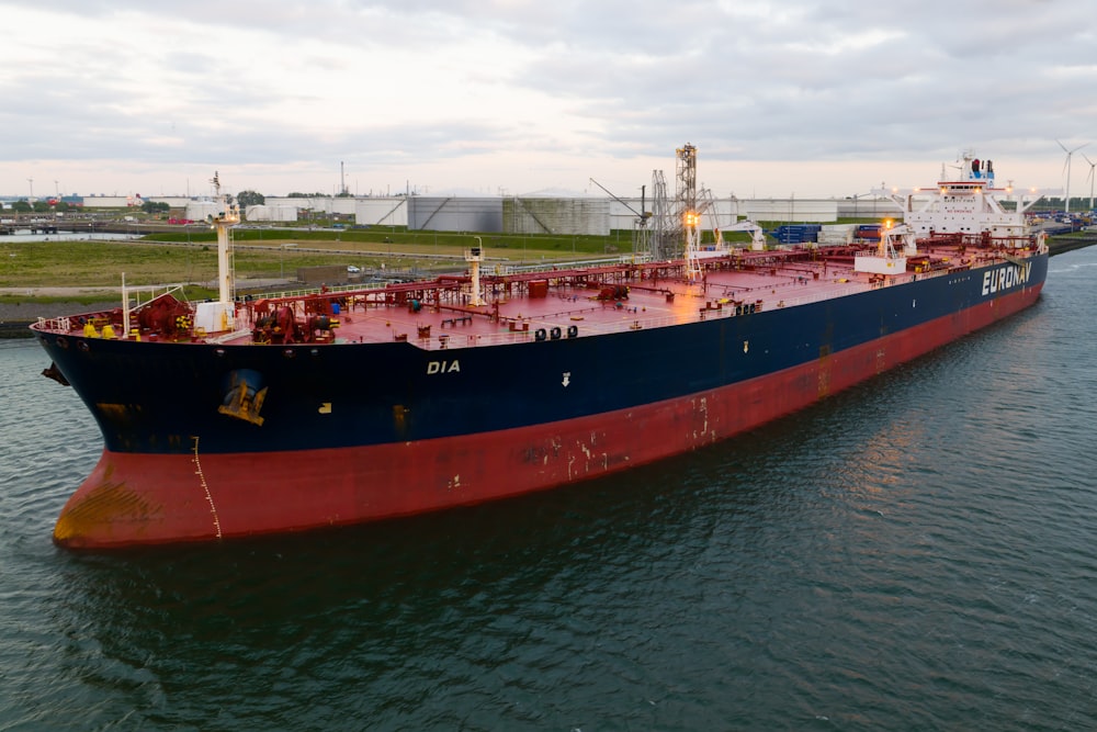 a large boat floating on top of a body of water