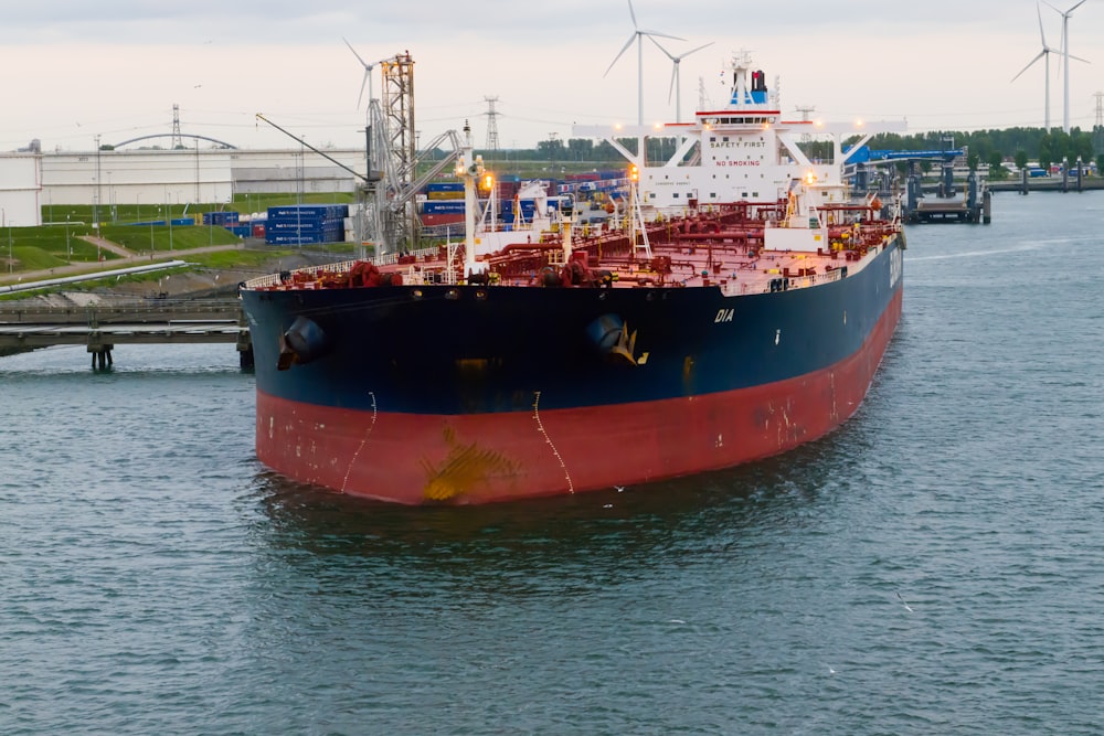 a large boat floating on top of a body of water