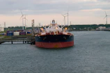 a large boat floating on top of a body of water