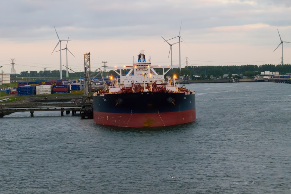 a large boat floating on top of a body of water